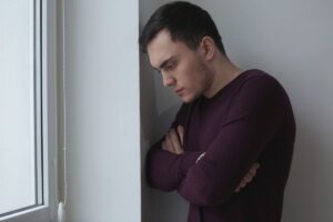 depressed man experiences long-term effects of cocaine use